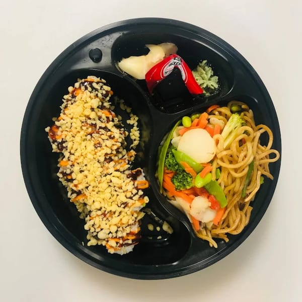 My Sushi & Catering LLC bento box with tempura sushi, noodles, vegetables, ginger, and wasabi.